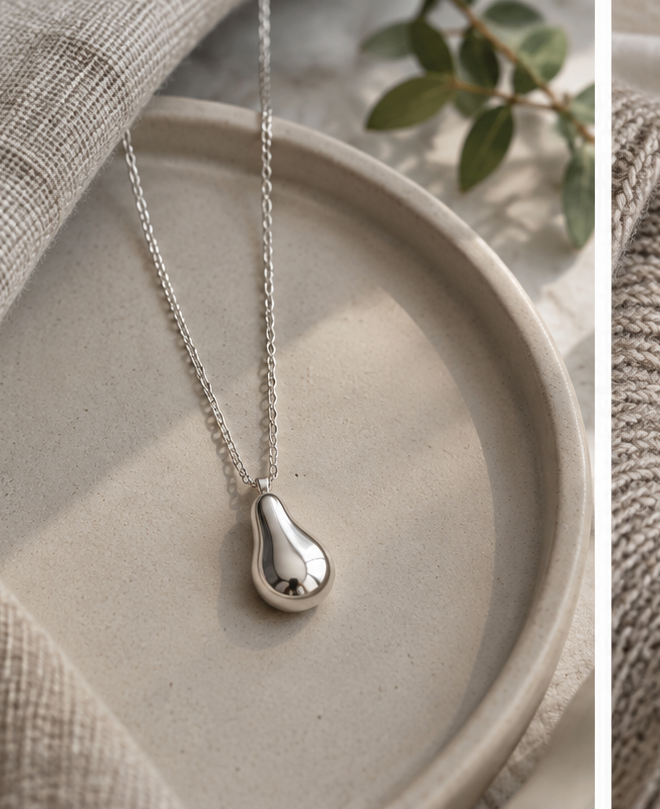 Silver-tone rounded pendant necklace with polished finish